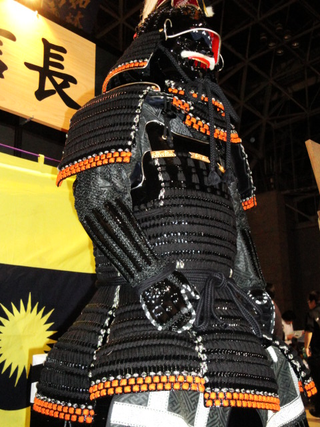 Illustration for article titled Booth Check: The Warlord Armor of TGS